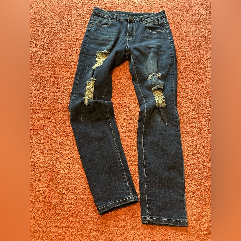 Distressed Blue Jeans